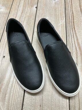 UGG Women’s Black Leather Slip-On Sneakers with White Sole